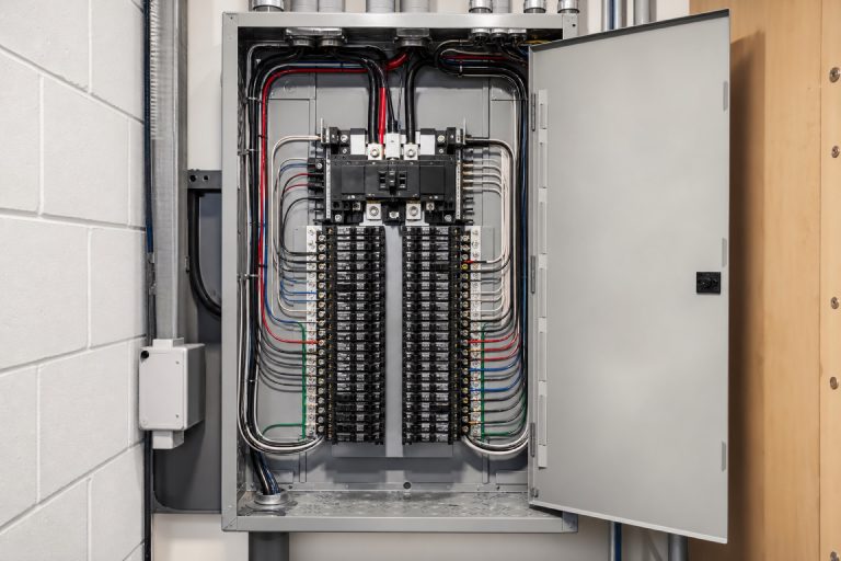 Modern electrical panel upgrade with new circuit breaker panel and professional installation