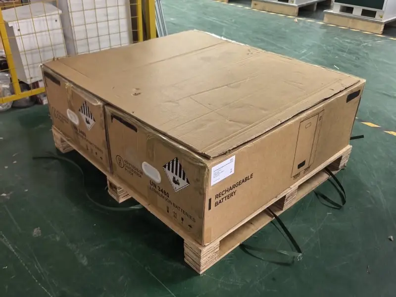 UN 3480 lithium ion battery packing in front of finished Weltrus C&I ESS cabinets