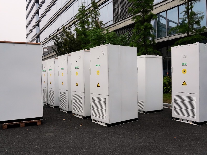 Rows of Weltrus commercial and industrial energy storage cabinets staged outdoors