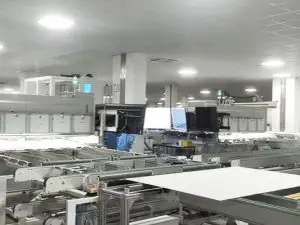 Weltrus solar panel factory hall with module conveyors and process monitors